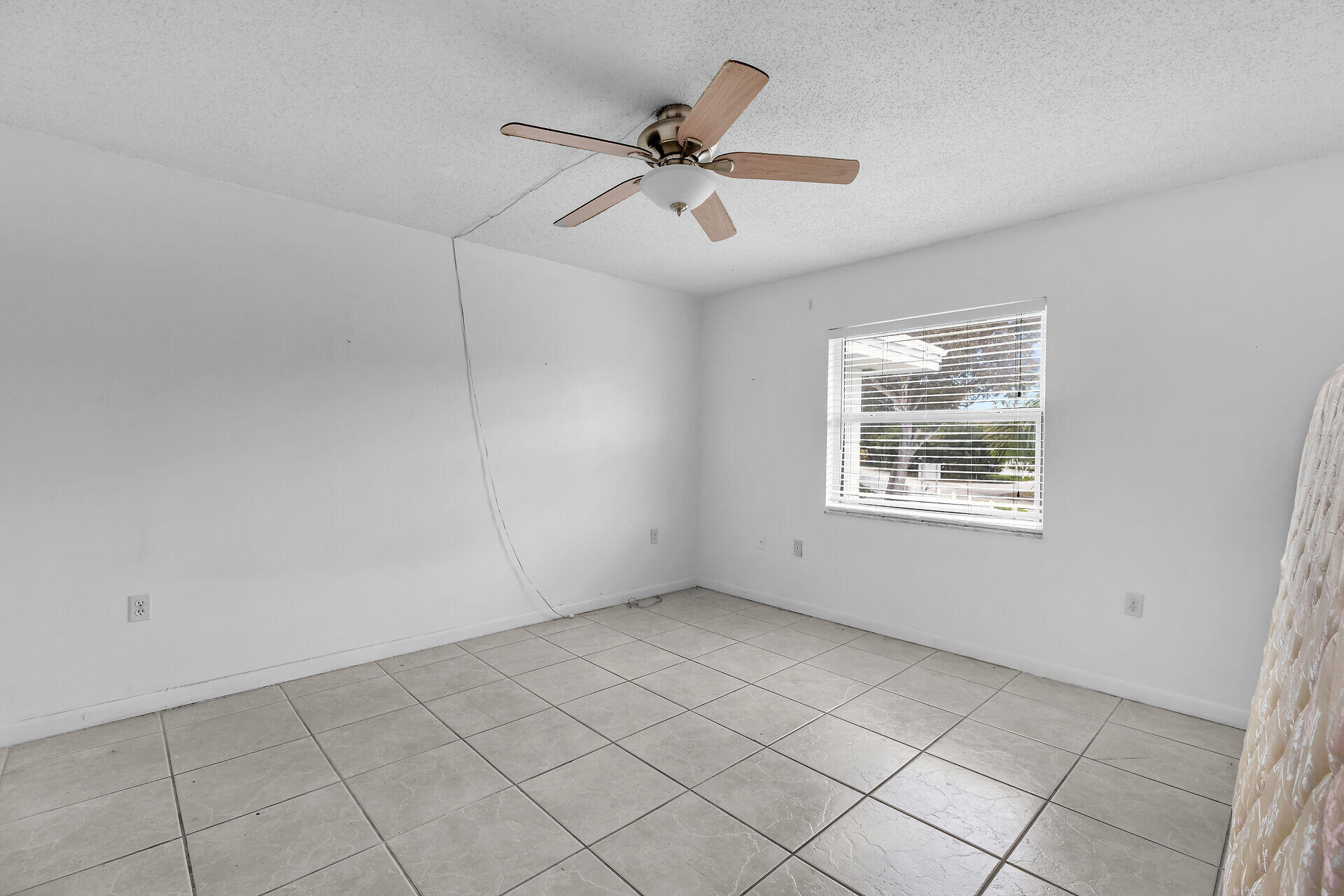 40 High Point Road, Unit F206 Tavernier, FL 33070 - Photo 23 of 24 a view of an empty room with a window