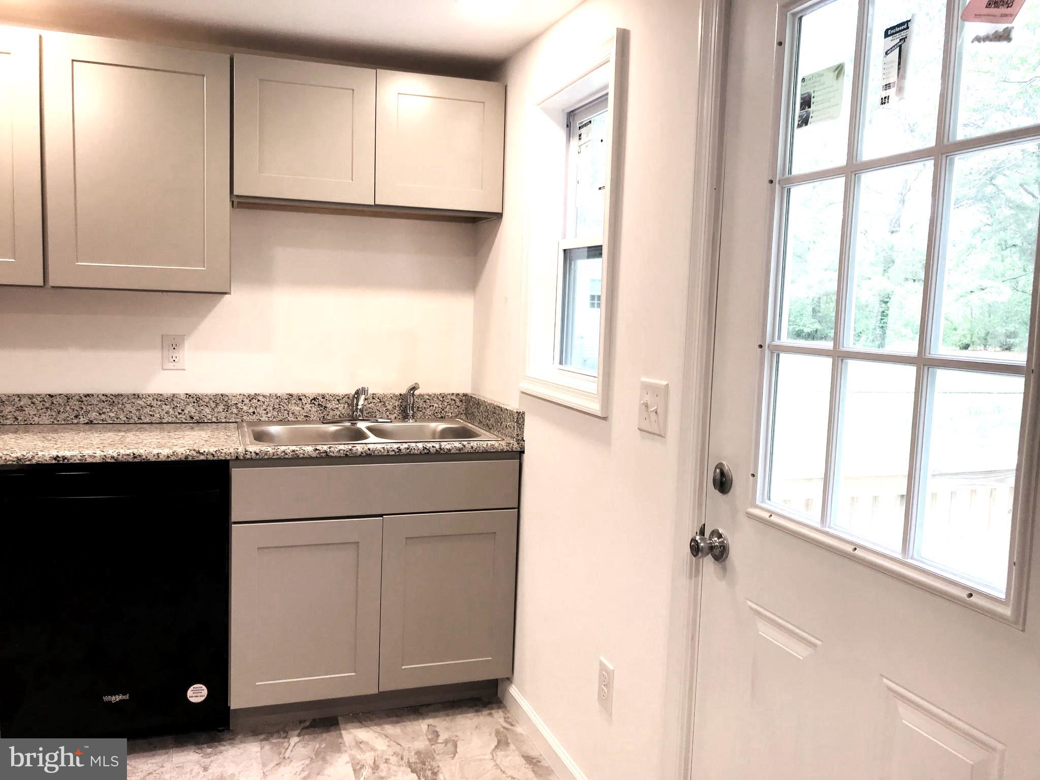 3913 South Upper Ferry Road Eden, MD 21822 - Photo 9 of 19 Kitchen Sink and Dishwasher