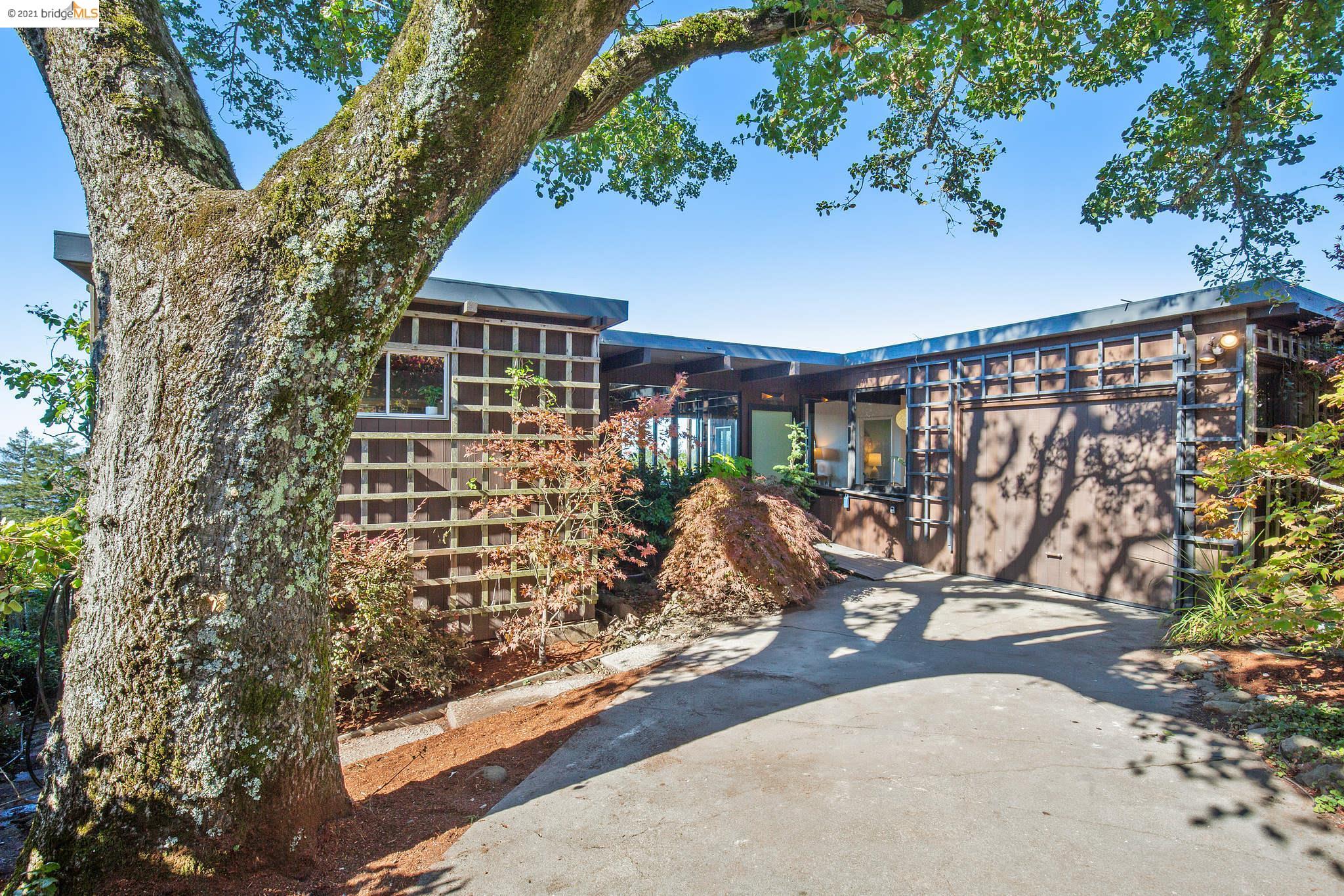 a view of a porch with a tree