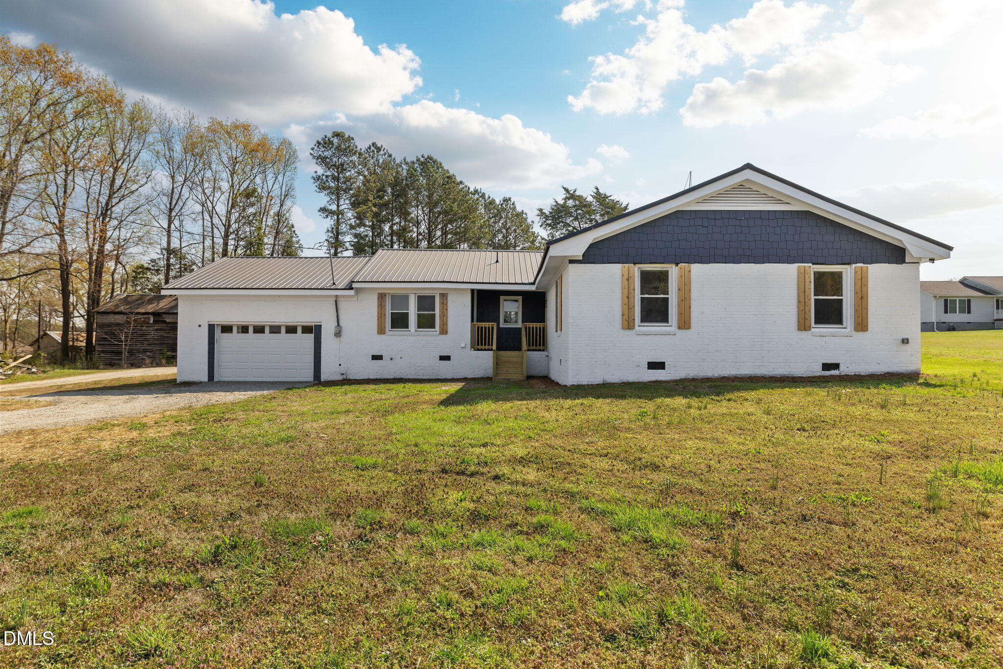 426 Rooker Dairy Road Norlina, NC 27563 - Photo 30 of 33 a view of a house with a yard