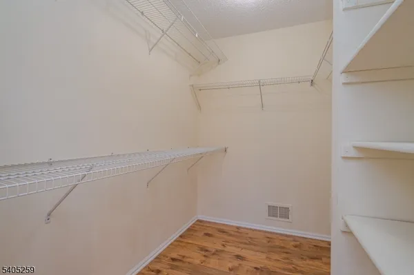 a view of a room with racks on the wall