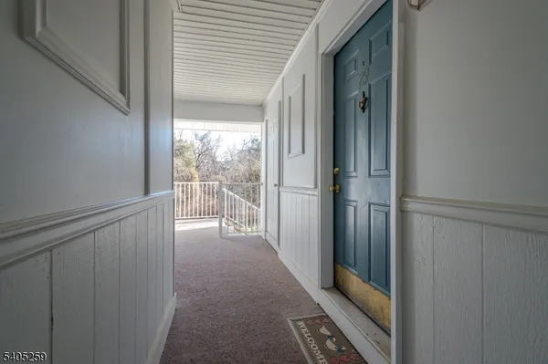 a view of a glass door and the balcony