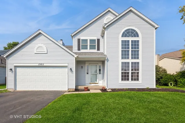 a view of outdoor space yard and front view of a house