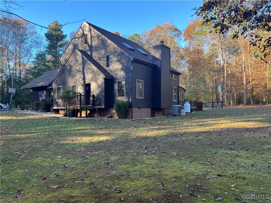 6220 Glebe Point Road Chesterfield, VA 23838 - Photo 12 of 50 a view of a house with a yard