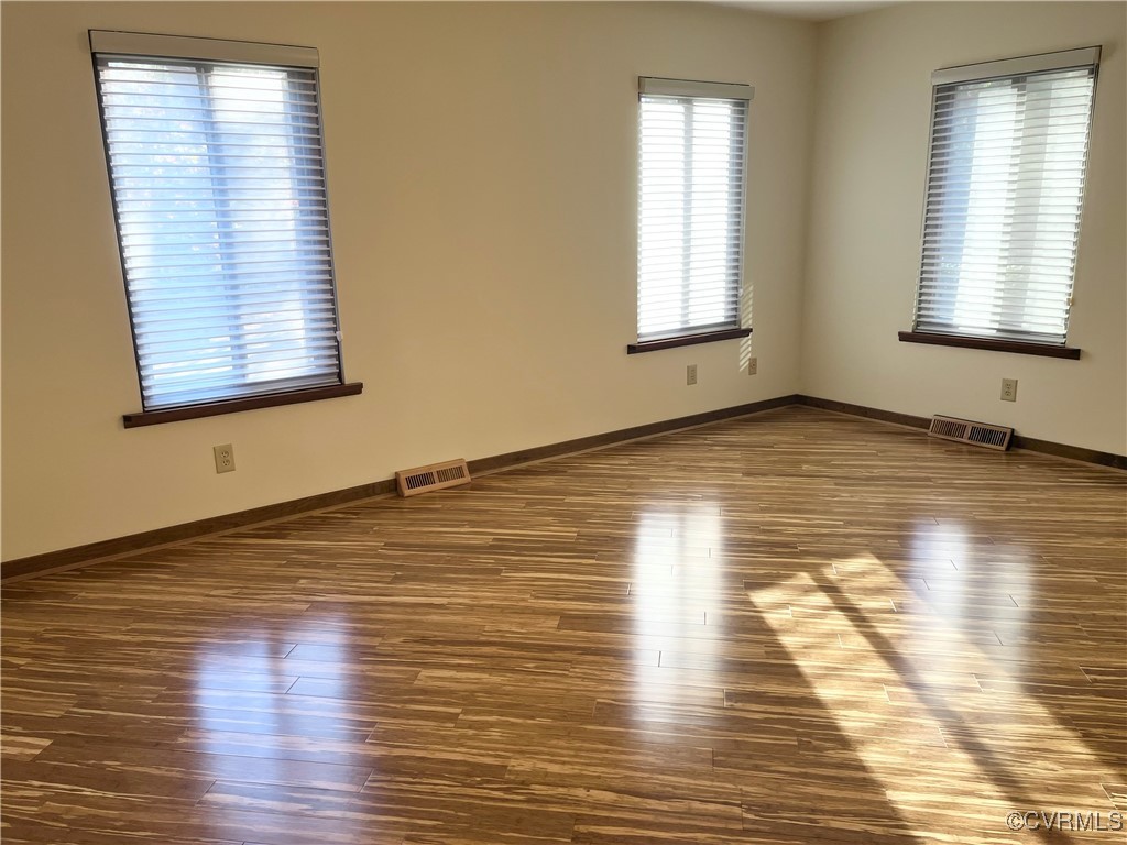 6220 Glebe Point Road Chesterfield, VA 23838 - Photo 28 of 50 a view of empty room with wooden floor and fan