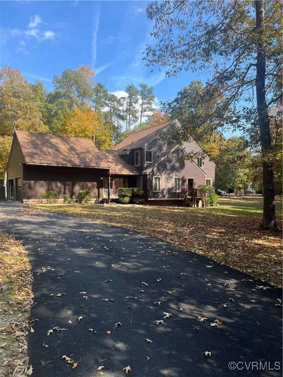 6220 Glebe Point Road Chesterfield, VA 23838 - Photo 3 of 50 a view of a town with large trees