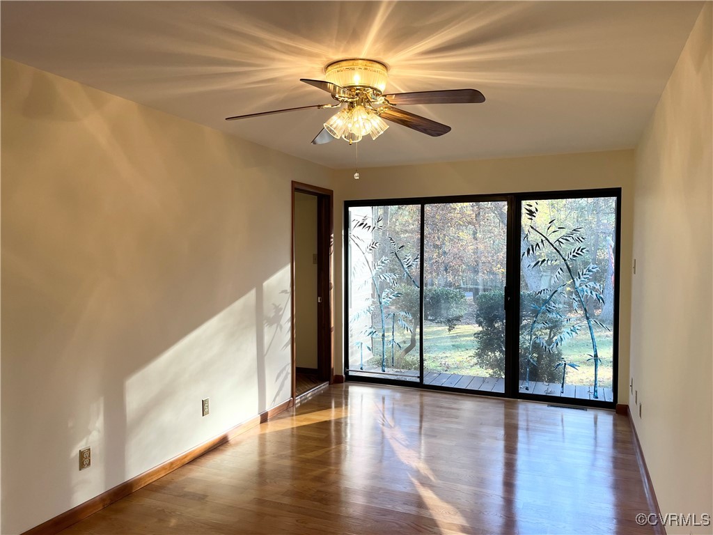 6220 Glebe Point Road Chesterfield, VA 23838 - Photo 32 of 50 wooden floor in an empty room with a window