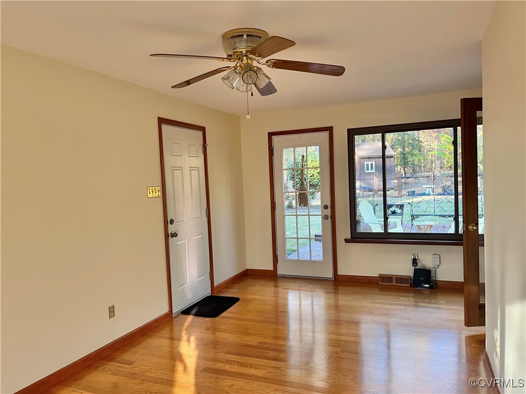 6220 Glebe Point Road Chesterfield, VA 23838 - Photo 33 of 50 a view of empty room with wooden floor and fan