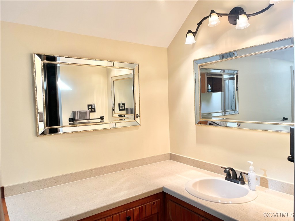 6220 Glebe Point Road Chesterfield, VA 23838 - Photo 39 of 50 a bathroom with a sink and a mirror