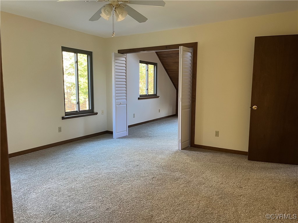 6220 Glebe Point Road Chesterfield, VA 23838 - Photo 41 of 50 an empty room with windows and cabinet