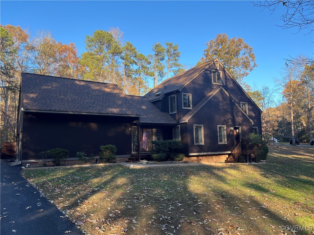 6220 Glebe Point Road Chesterfield, VA 23838 - Photo 6 of 50 a front view of a house with a yard
