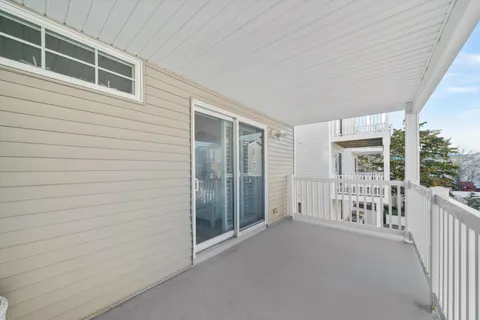 a view of livingroom with balcony