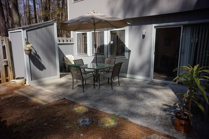608 Dylan Court Raleigh, NC 27606 - Photo 10 of 12 Relax and BBQ in the excellent outdoor space! This oversized enclosed patio area features a privacy fence, storage room and a large garden space! Fenced Patio
