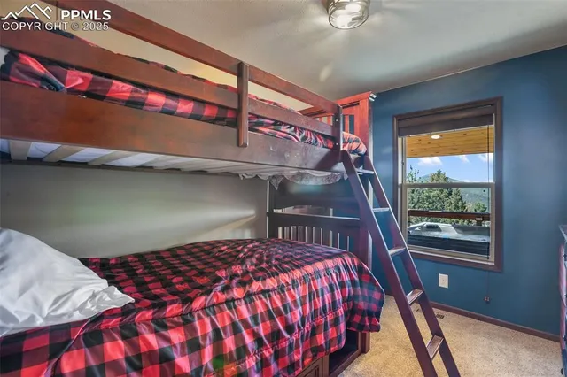 a bathroom with a granite countertop sink a mirror and a shower
