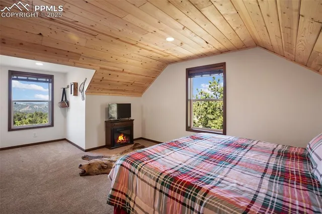 a view of a brick building with a bench windows and bench