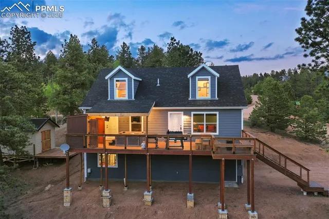 a view of a town with mountains in the background