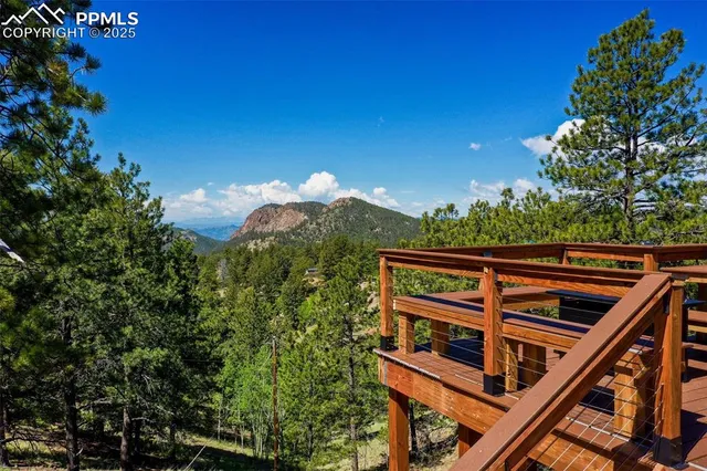 a view of a tree in a balcony