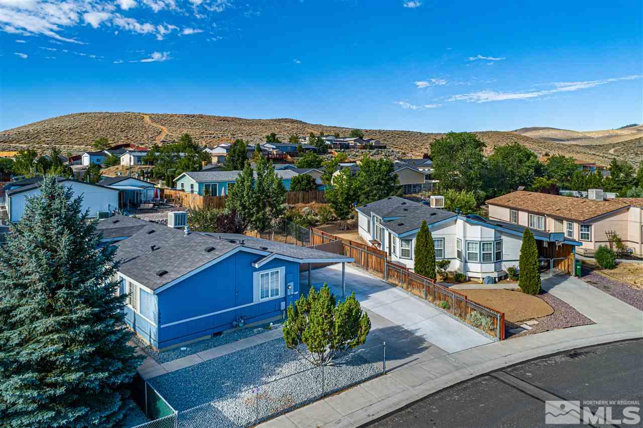 1298 Leopard Street Reno, NV 89506 - Photo 1 of 16 a view of a city with the houses