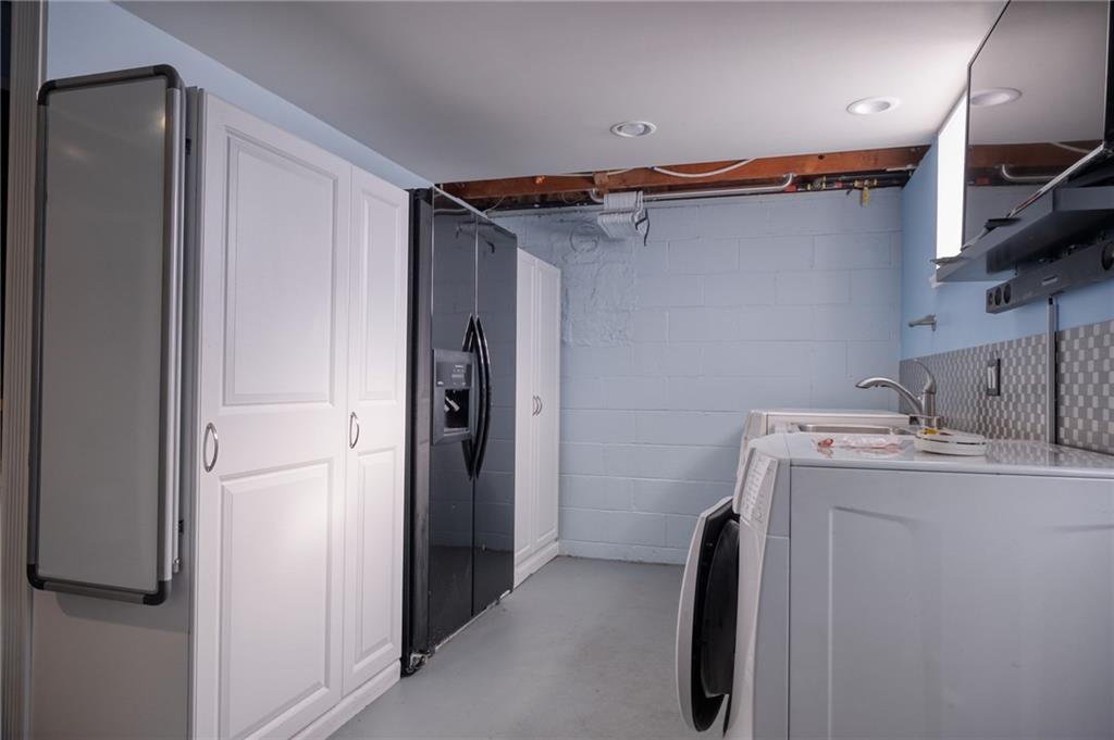 918 Stock Street Pittsburgh, PA 15207 - Photo 16 of 20 a utility room with closet and mirror