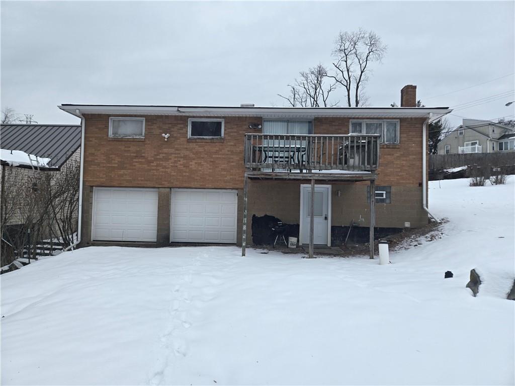 918 Stock Street Pittsburgh, PA 15207 - Photo 19 of 20 a view of a house with a balcony and parking space