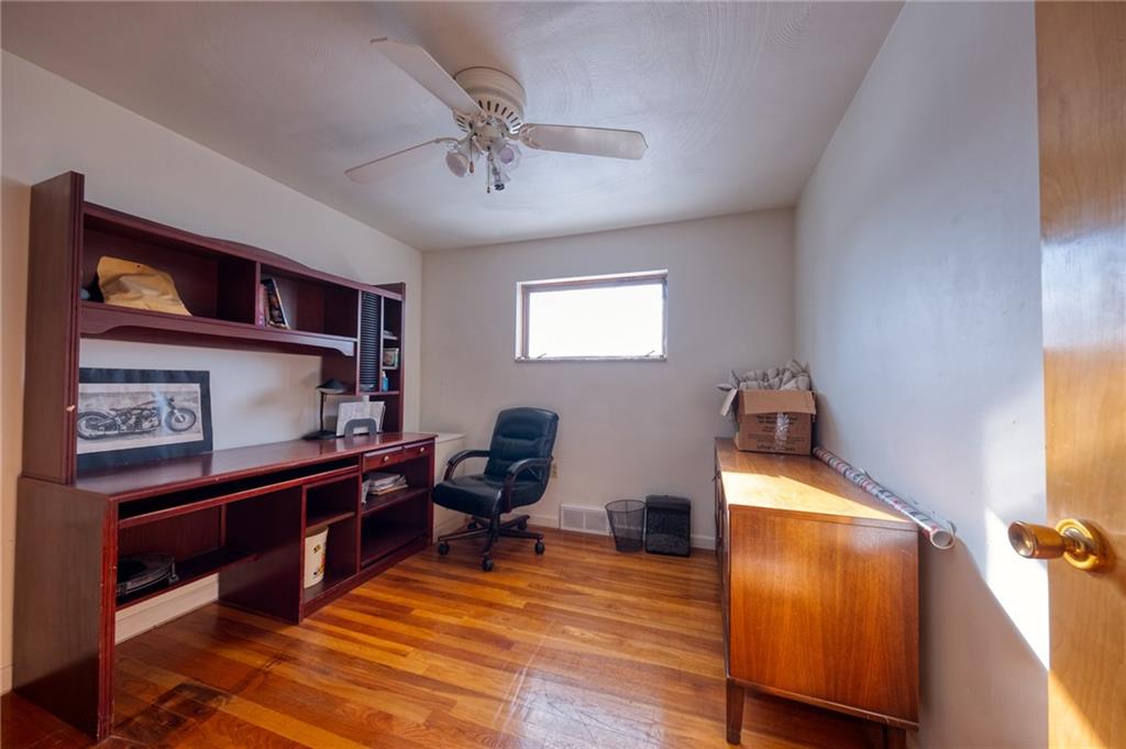918 Stock Street Pittsburgh, PA 15207 - Photo 9 of 20 a view of a workspace with furniture and a window