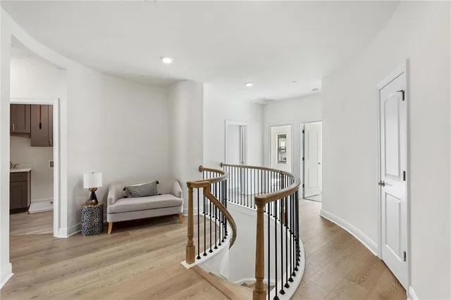 a view of a livingroom with furniture and staircase