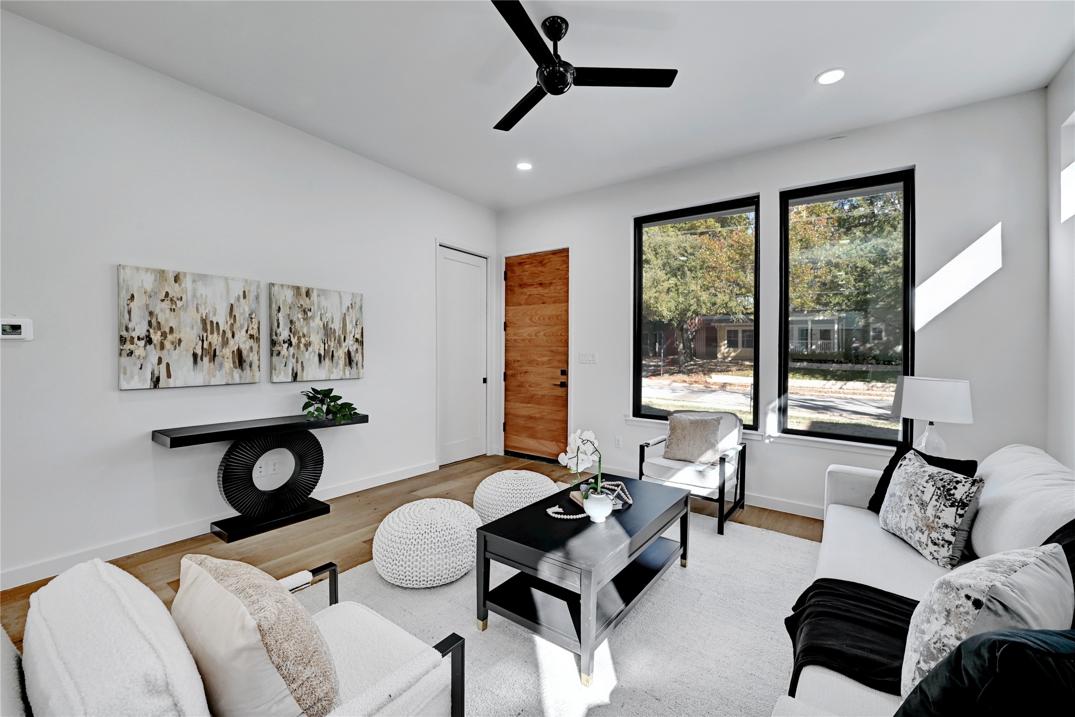 2717 Lyons Road, Unit 1 Austin, TX 78702 - Photo 4 of 34 Living area with ceiling fan, recessed lighting, and wood finished floors
