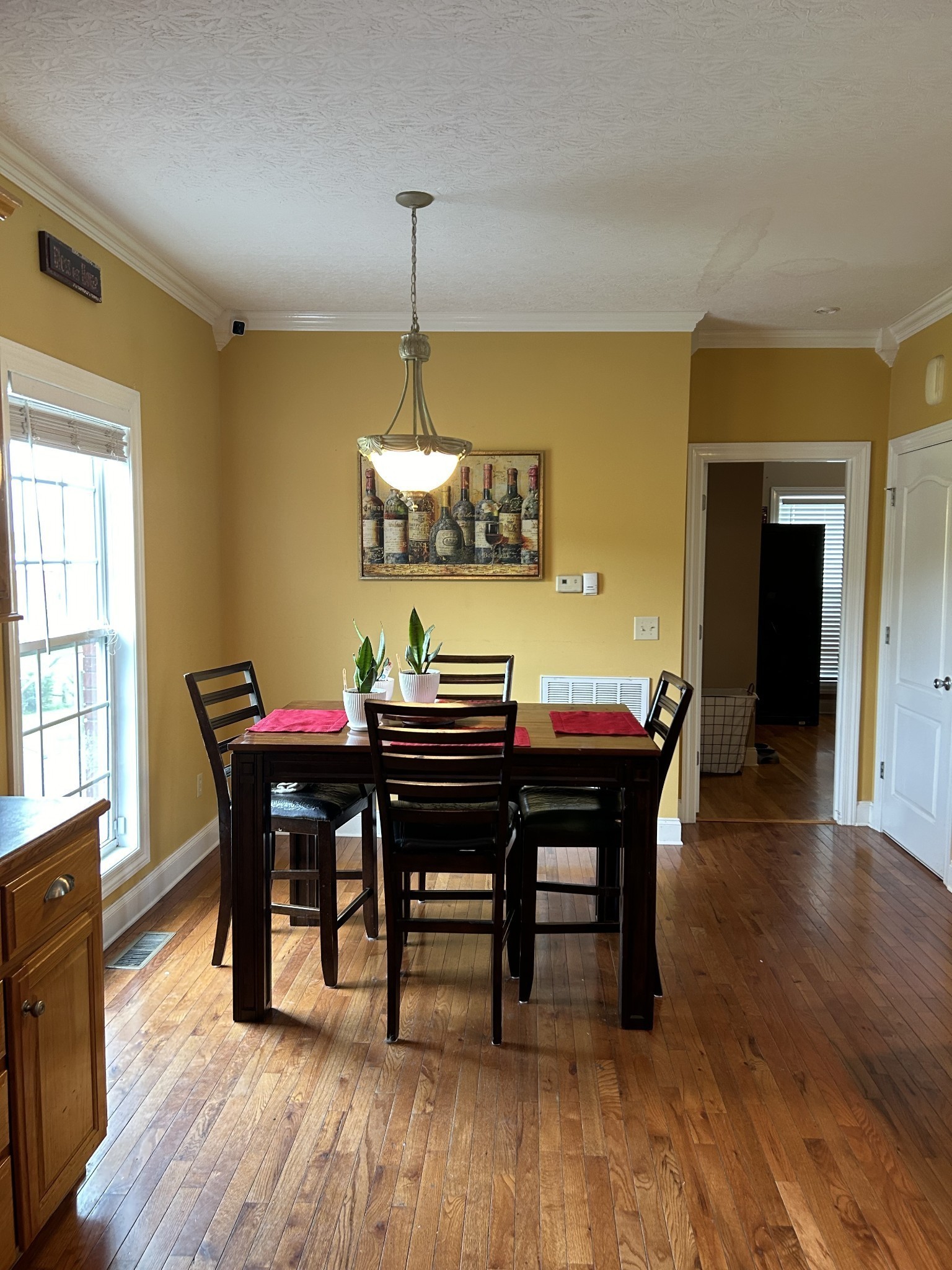 3421 George Olive Road Iron City, TN 38463 - Photo 21 of 51 a view of a dining room with furniture and wooden floor