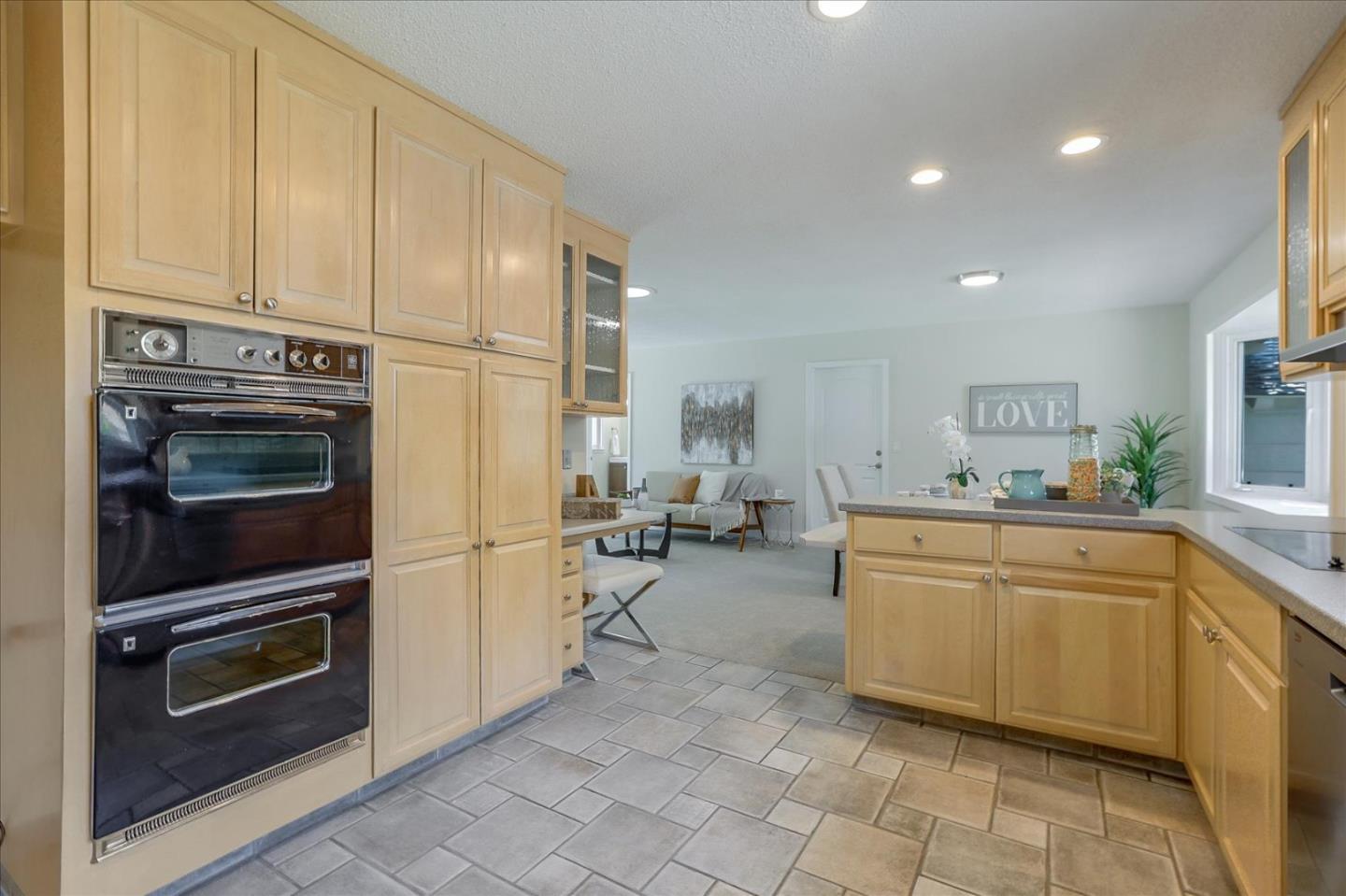 1660 Fordham Way Mountain View, CA 94040 - Photo 15 of 37 a kitchen with appliances cabinets and furniture