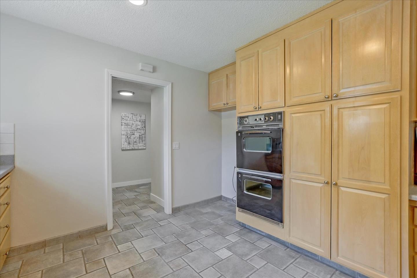 1660 Fordham Way Mountain View, CA 94040 - Photo 16 of 37 an empty room with a kitchen