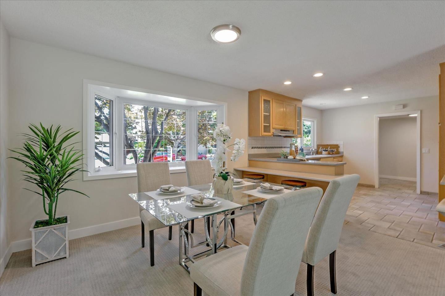 1660 Fordham Way Mountain View, CA 94040 - Photo 18 of 37 a view of a dining room with furniture window and outside view