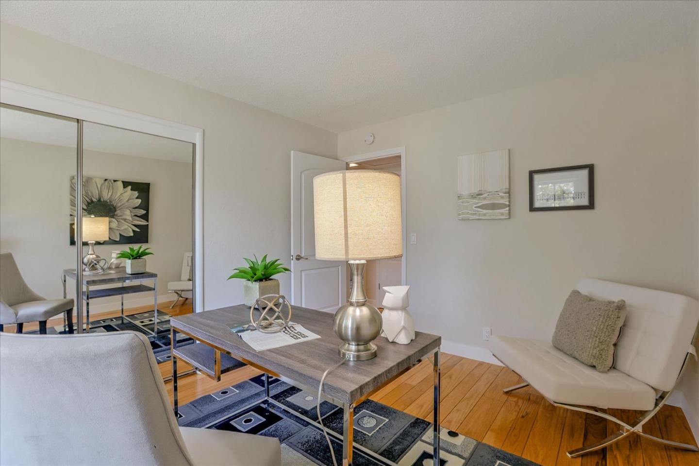 1660 Fordham Way Mountain View, CA 94040 - Photo 20 of 37 a living room with furniture and wooden floor