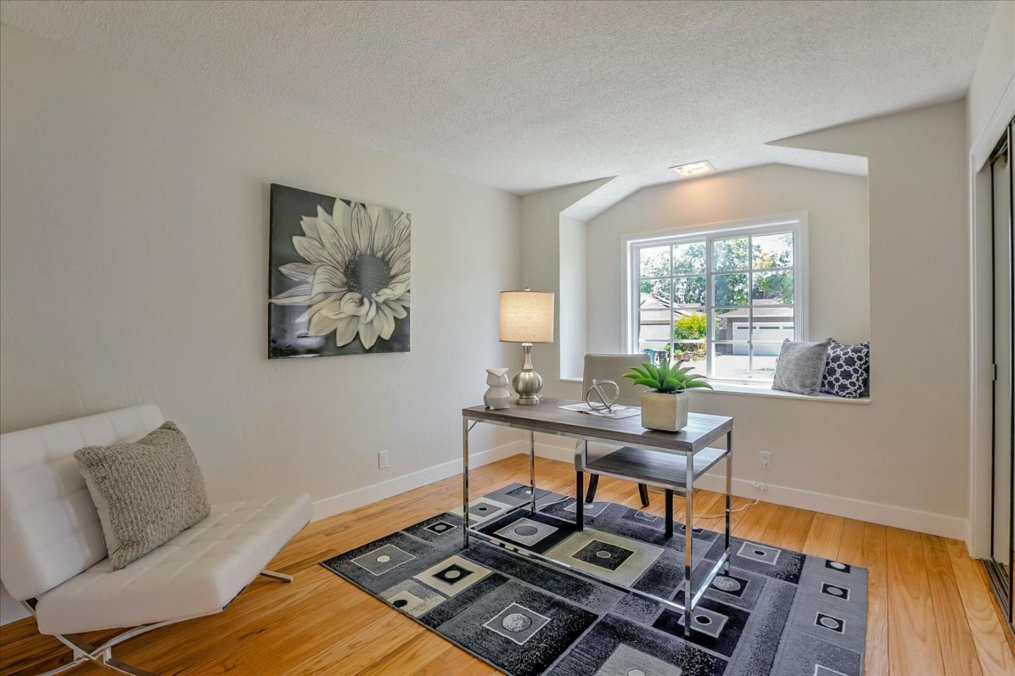 1660 Fordham Way Mountain View, CA 94040 - Photo 21 of 37 a living room with furniture and a window