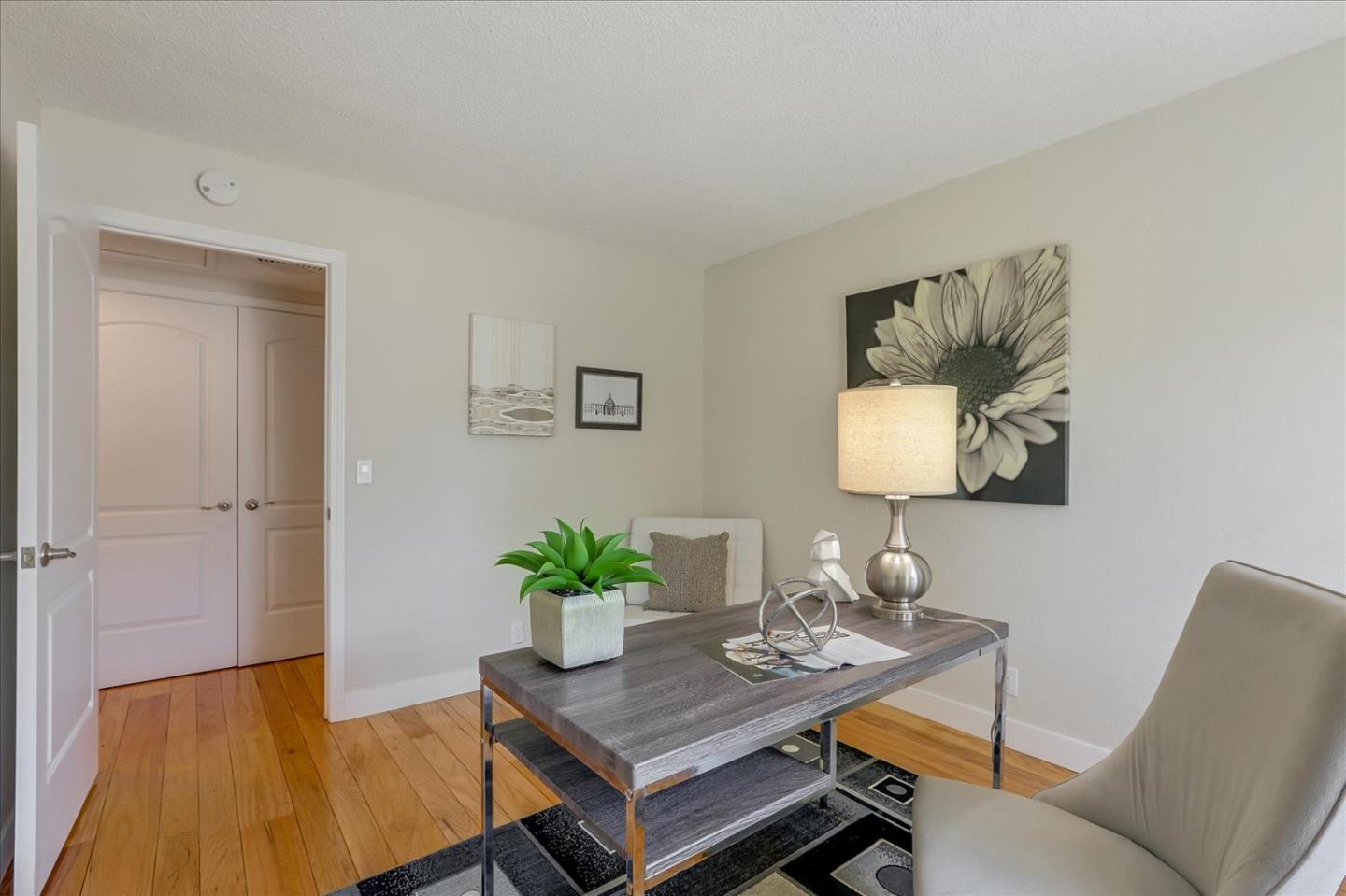 1660 Fordham Way Mountain View, CA 94040 - Photo 22 of 37 a dining room with furniture and wooden floor