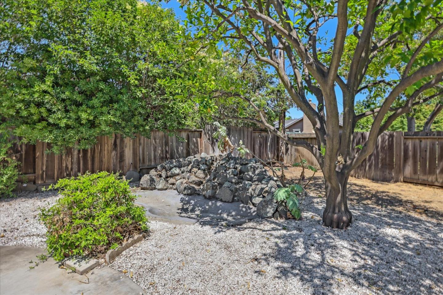 1660 Fordham Way Mountain View, CA 94040 - Photo 35 of 37 a backyard of a house with lots of green space
