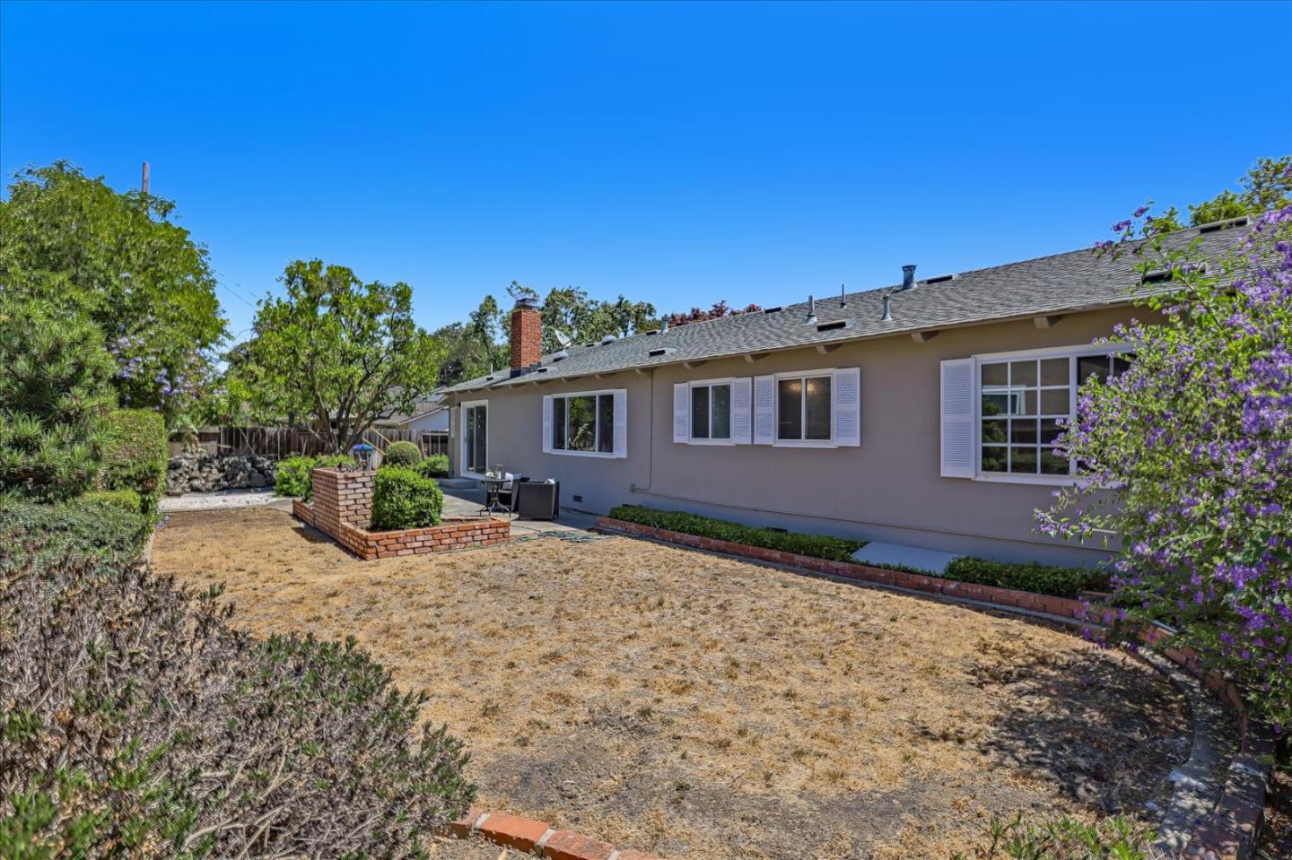 1660 Fordham Way Mountain View, CA 94040 - Photo 36 of 37 a view of a house with wooden fence
