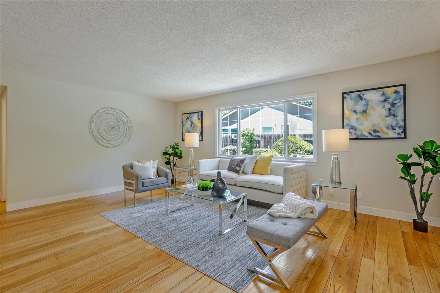 1660 Fordham Way Mountain View, CA 94040 - Photo 7 of 37 a living room with furniture and a large window