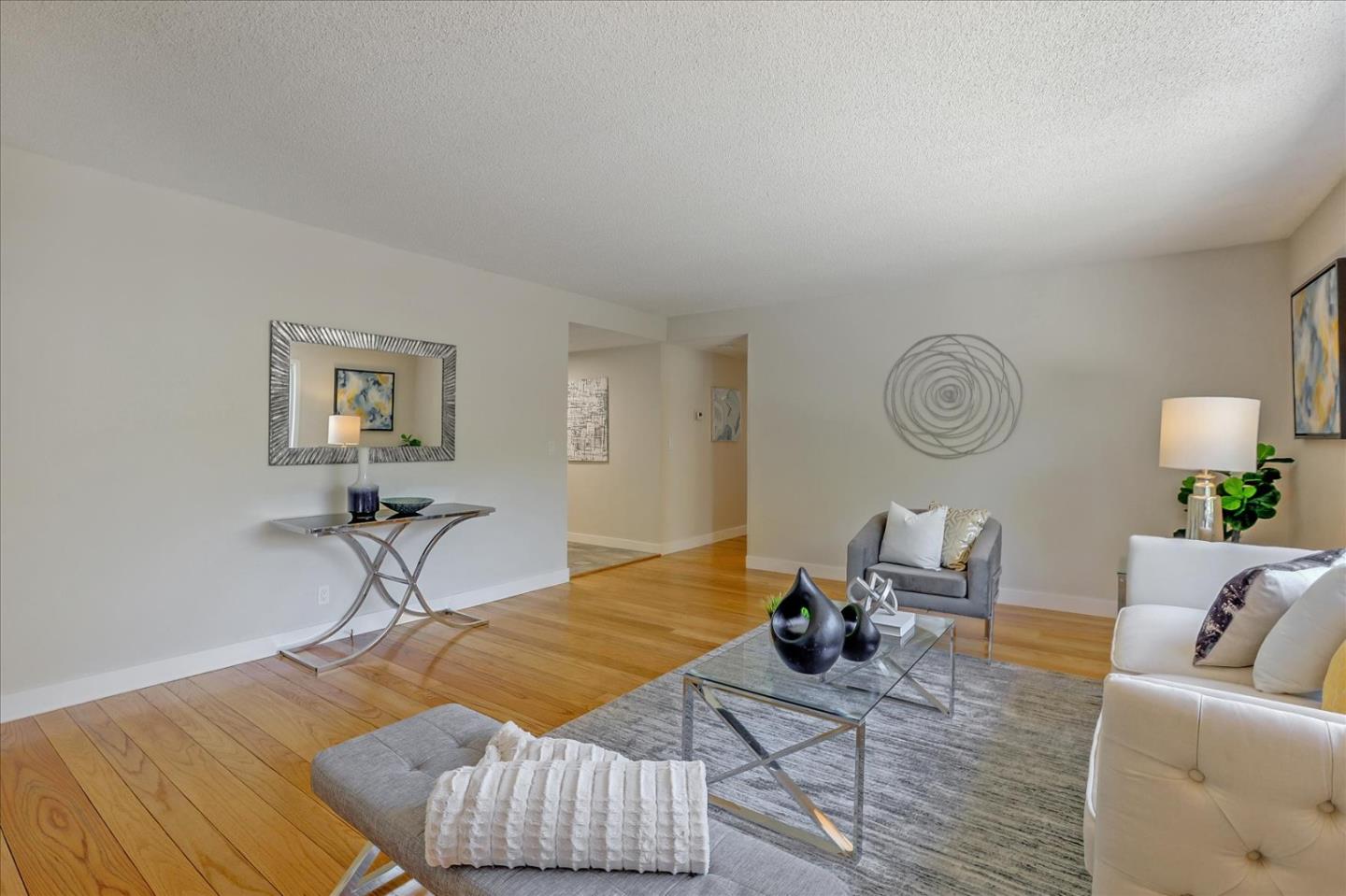 1660 Fordham Way Mountain View, CA 94040 - Photo 8 of 37 a living room with furniture and a wooden floor