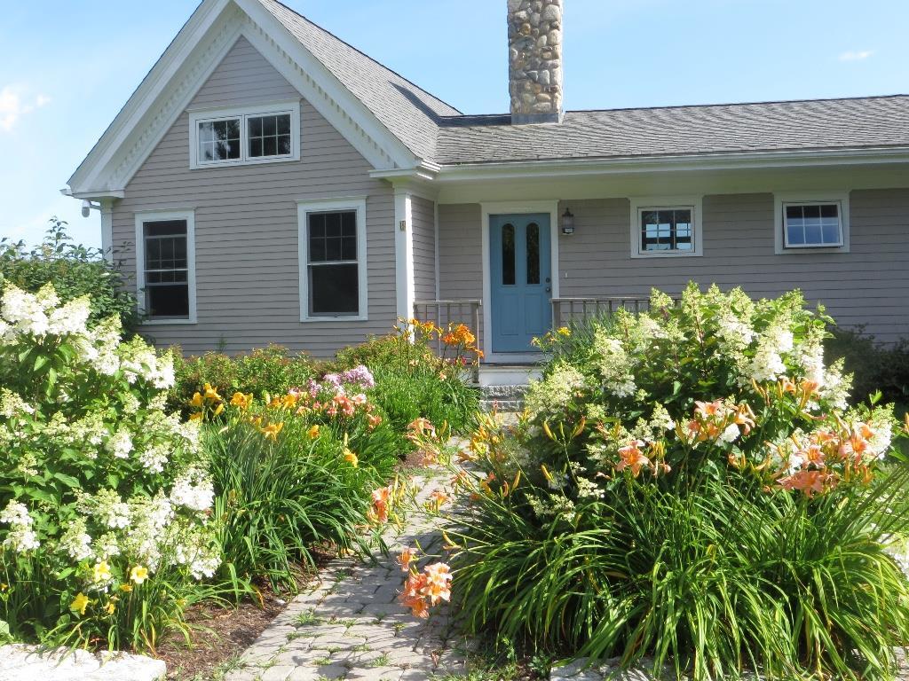 8 Tukey Lane Chamberlain, ME 04541 - Photo 2 of 20 A close up of the rear garden entrance.