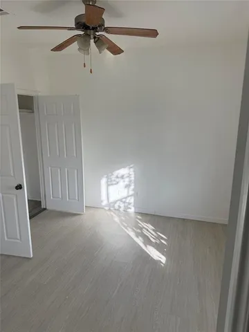 a view of empty room with windows