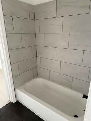 a bathroom with a bathtub