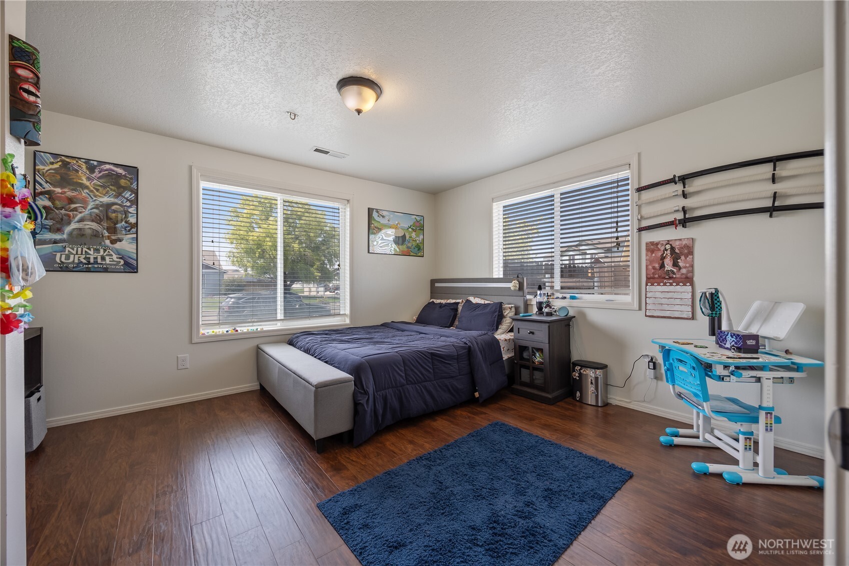 5421 Jackson Lane Pasco, WA 99301 - Photo 11 of 40 a bedroom with furniture and a window