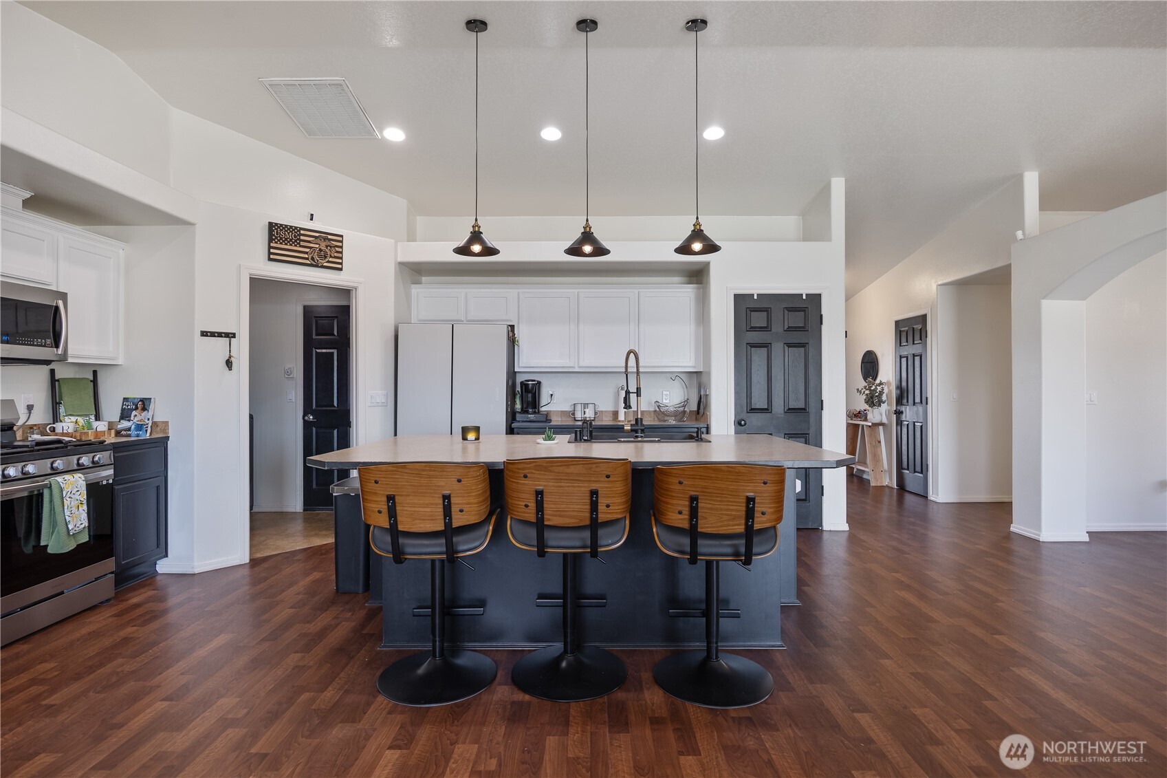 5421 Jackson Lane Pasco, WA 99301 - Photo 15 of 40 a large kitchen with a table and chairs