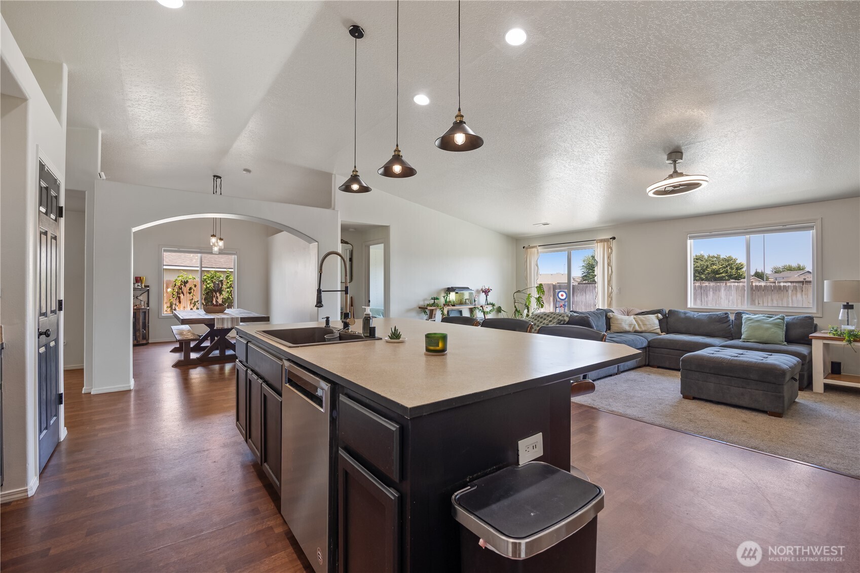 5421 Jackson Lane Pasco, WA 99301 - Photo 17 of 40 a room with stainless steel appliances lots of wooden furniture