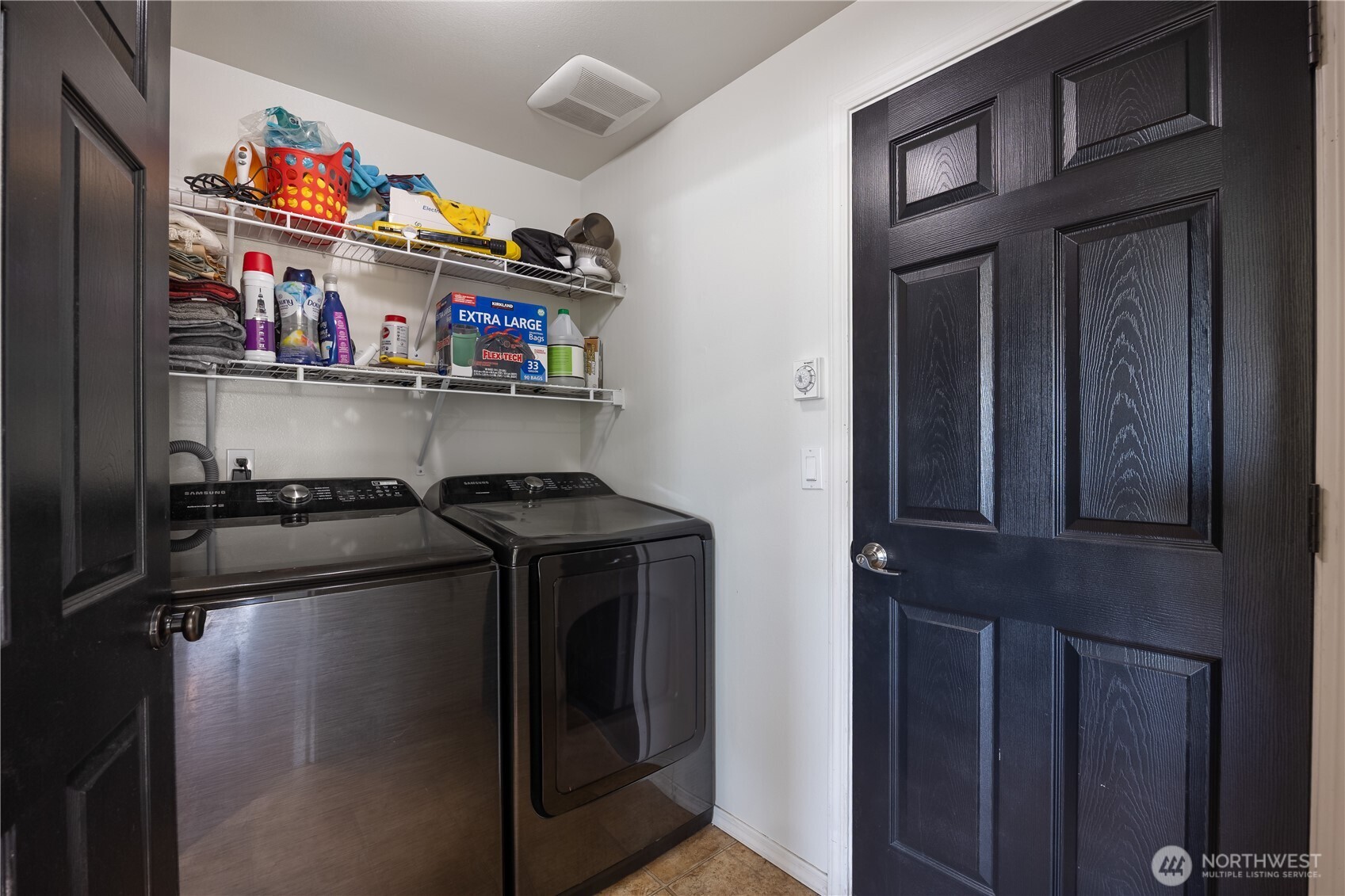 5421 Jackson Lane Pasco, WA 99301 - Photo 18 of 40 a kitchen with stainless steel appliances granite countertop a refrigerator and a stove