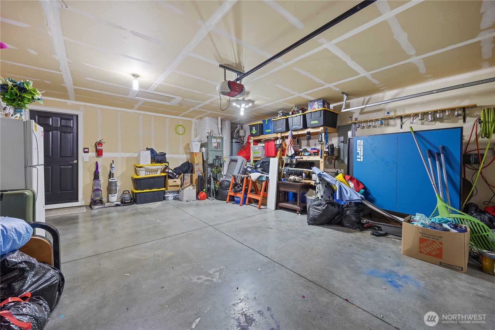 5421 Jackson Lane Pasco, WA 99301 - Photo 19 of 40 a view of a storage room with a lot of stuff