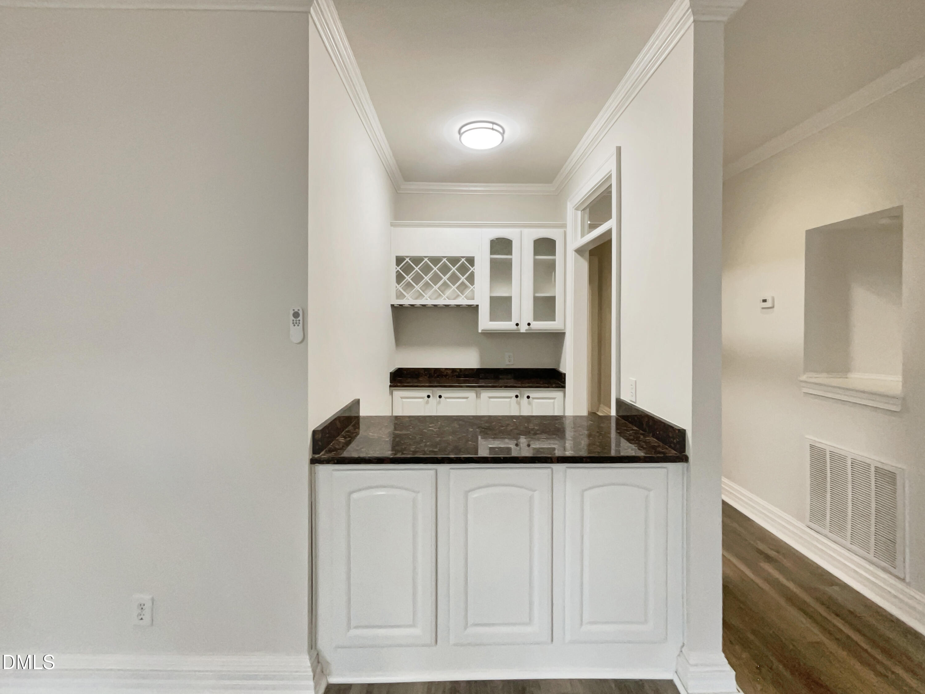 6212 Trevor Court Raleigh, NC 27613 - Photo 12 of 24 a kitchen with a stove and cabinets