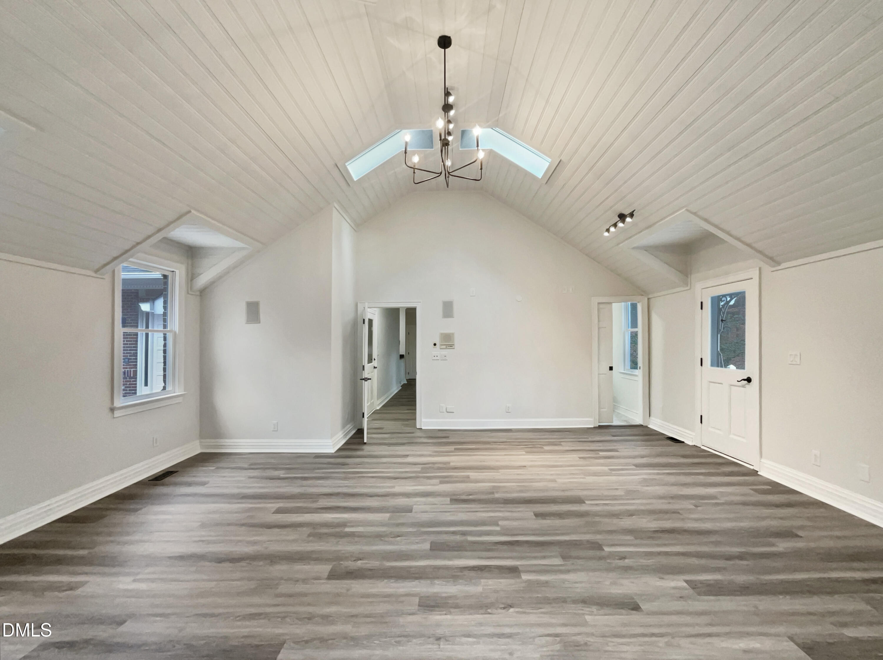 6212 Trevor Court Raleigh, NC 27613 - Photo 14 of 24 a view of empty room with wooden floor