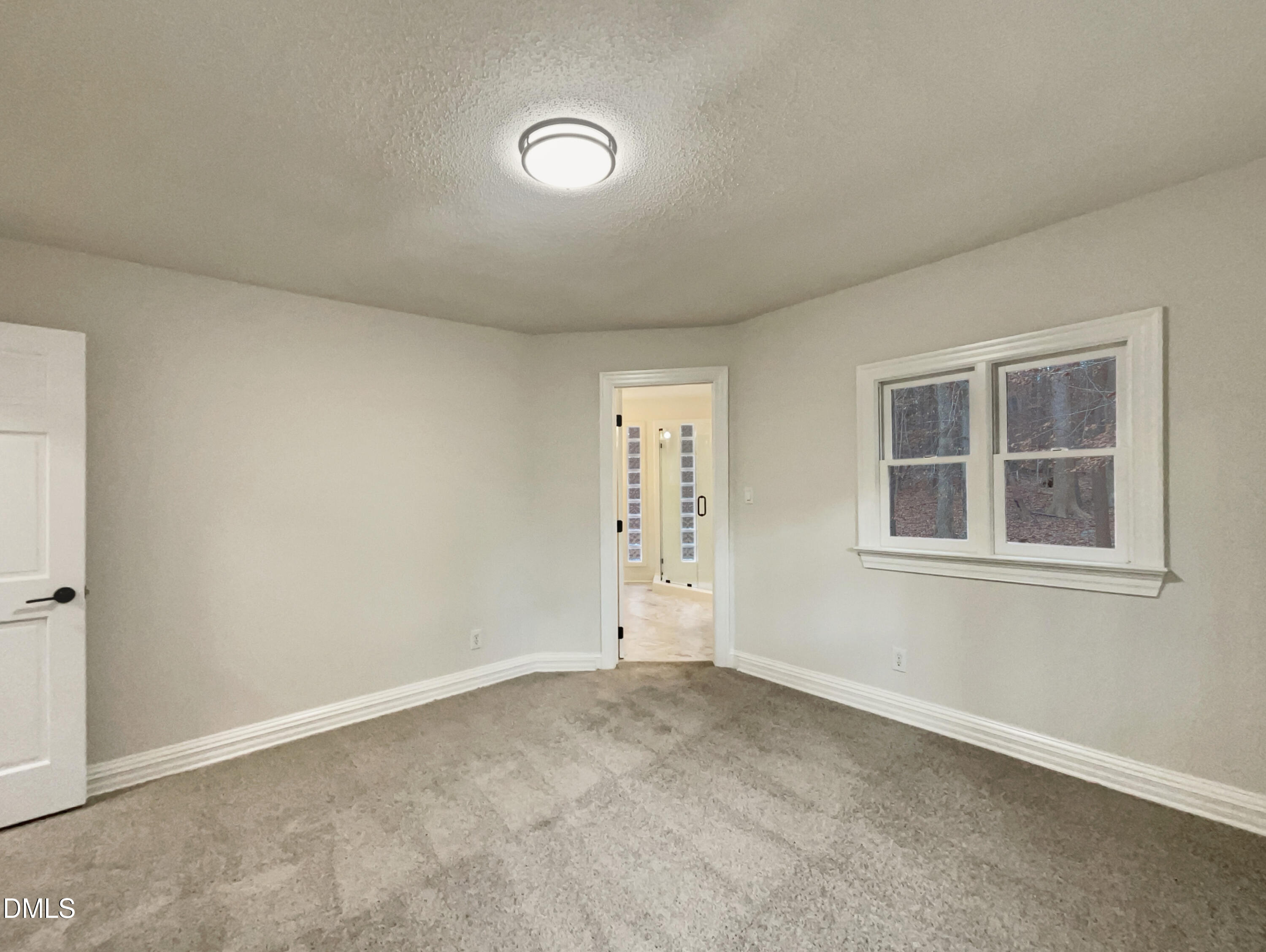 6212 Trevor Court Raleigh, NC 27613 - Photo 21 of 24 an empty room with windows