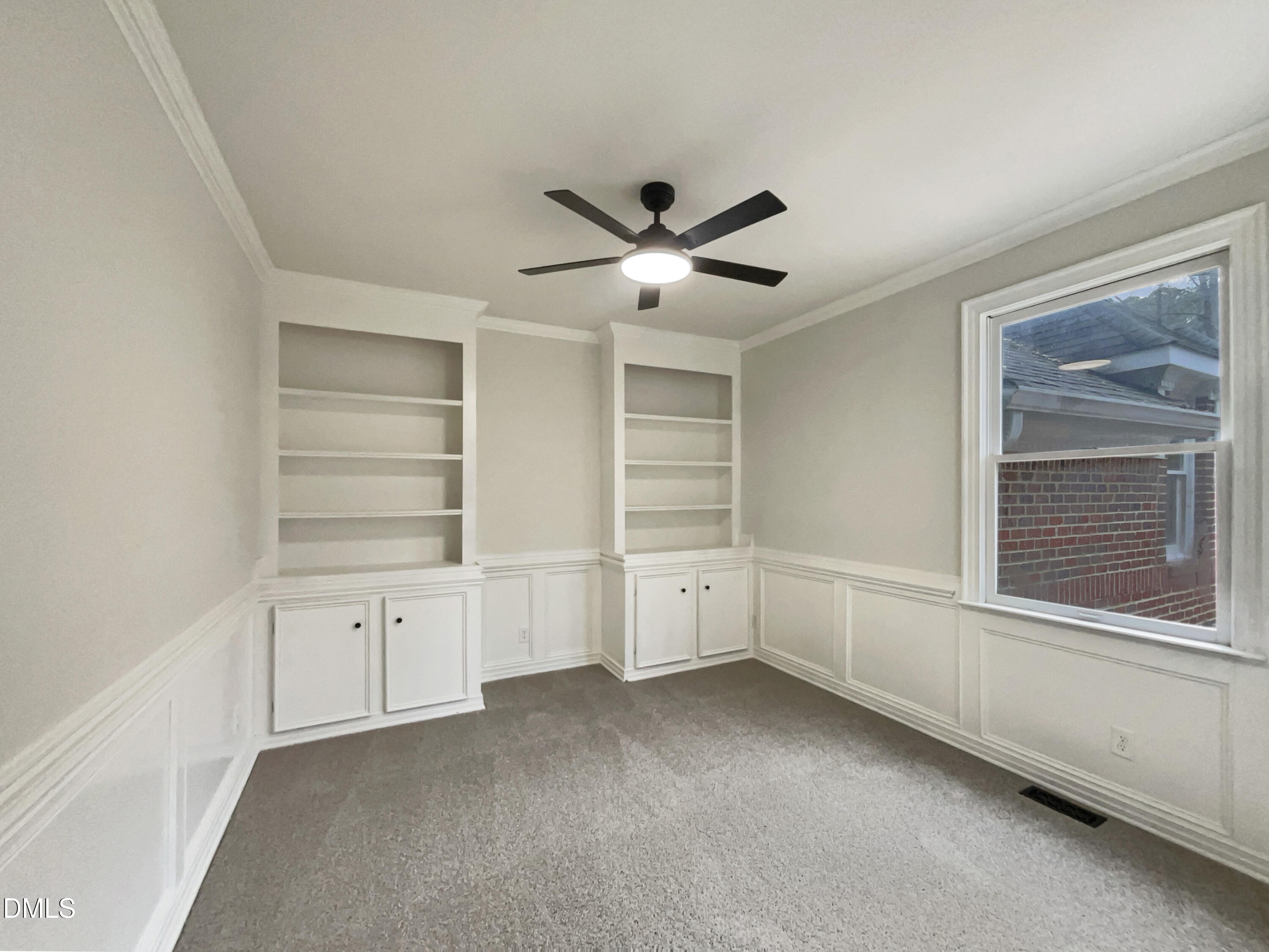 6212 Trevor Court Raleigh, NC 27613 - Photo 8 of 24 a view of an empty room with a window